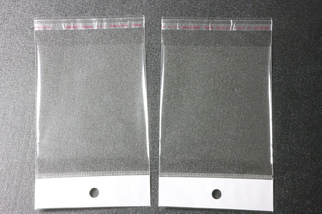 Transparent bags with adhesive strips 90x130mm