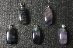 Set of 5 fluorite tumbled stones with eyelet