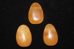 Set of 5 drilled orange calcite tumbled stone