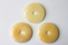 Set of 3 aragonite, yellow 40mm donuts